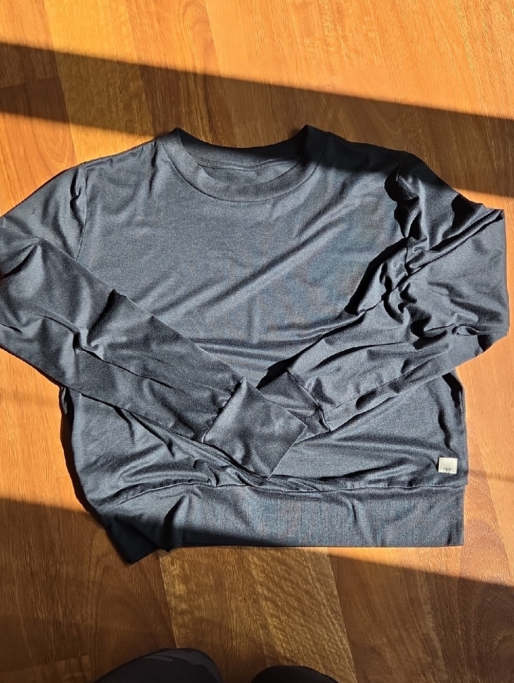 Vuori Black Crewneck Long Sleeved Tee with Hem Tag